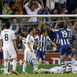 Espanyol's players celebrate a goal against Real Madrid during their Spanish First division soccer league match at Cornella-El Prat stadium, near Barcelona